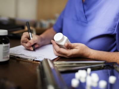 Doctor writing prescription