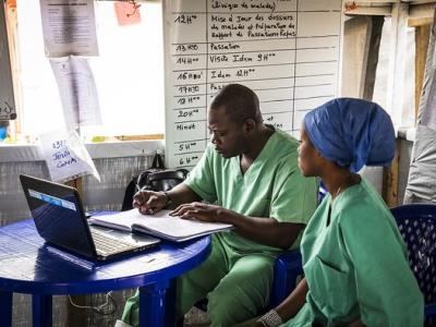 DR Congo Ebola health workers at laptop