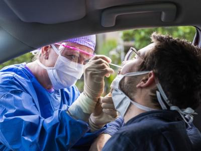 Drive-through nasal swab testing