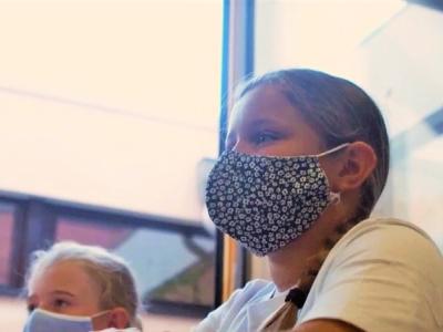 Dutch schoolgirls wearing masks