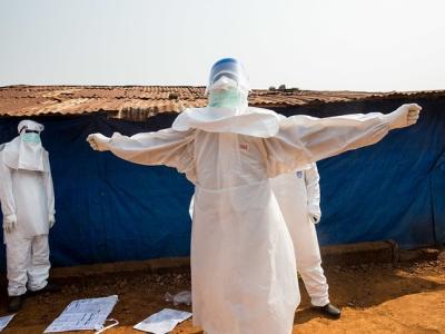 Ebola burial team with protective equipment