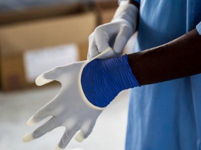 Ebola gloving up