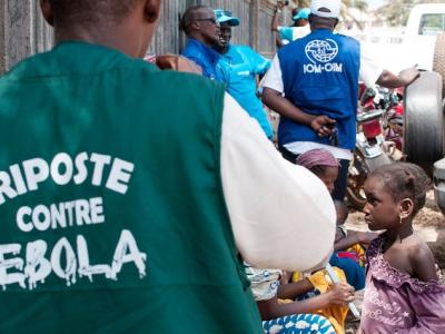 Boy with jacket "Riposte contre Ebola"