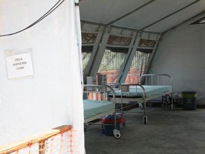 Ebola suspected cases sign and empty beds