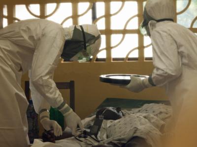 Workers care for Ebola patients