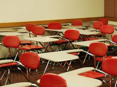 Desks in empty classroom