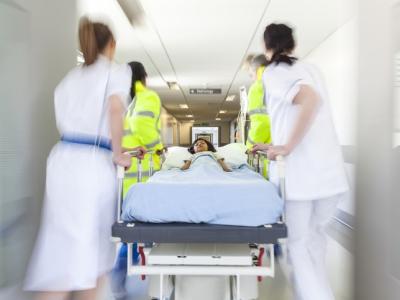 Child on gurney in emergency department