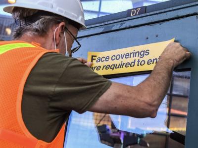 Face mask sign on New York City subway train