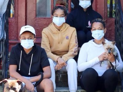 Family with masks on