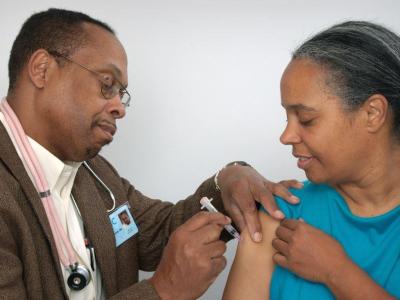 woman receiving vaccination