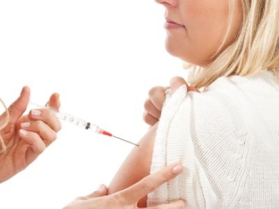 Woman receiving flu vaccine
