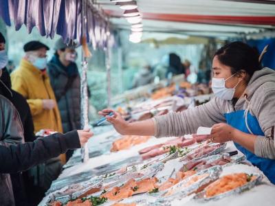 Fish market in France, mask wearing