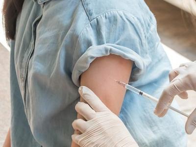 Girl getting HPV vaccine