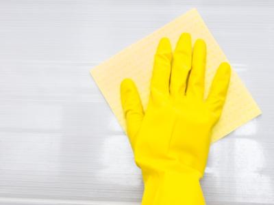 Gloved cleaning hand