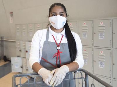 Grocery worker wearing mask