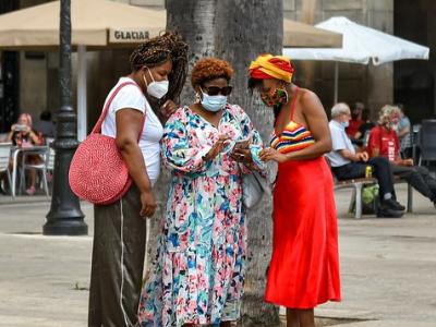 Group of women wearing masks