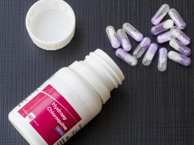 Hydroxychloroquine bottle and pills