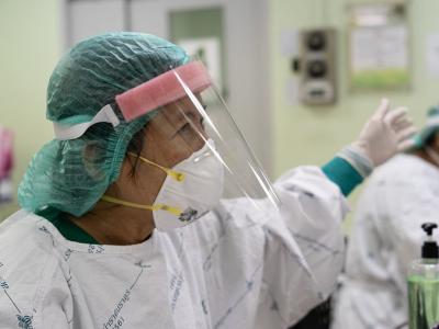 Health worker wearing personal protective equipment