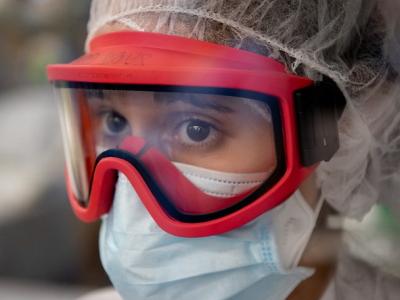 Healthcare worker wearing mask goggles