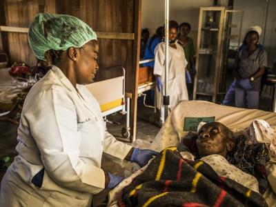 Health worker with patient in DR Congo