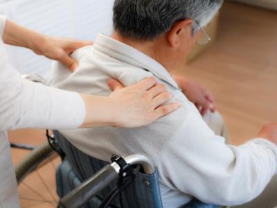 Home care of man in wheelchair
