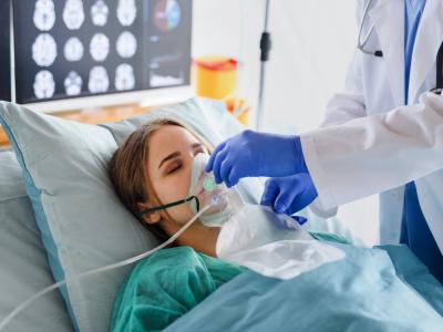 Hospital patient receiving supplemental oxygen