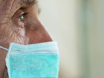 Older person in a mask