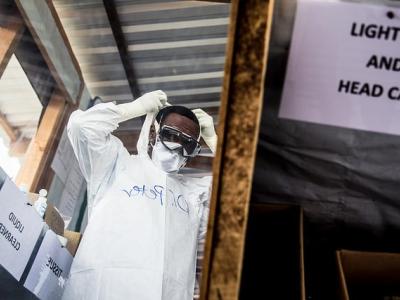Donning personal protective equipment Ebola