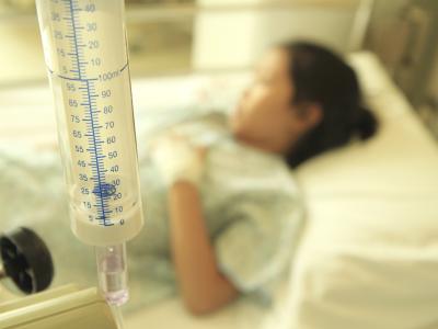 Girl in hospital bed