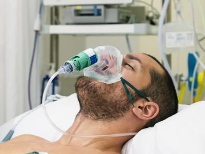 Male patient with oxygen mask