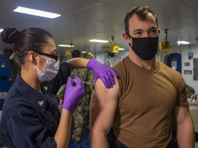 Man getting COVID vaccine