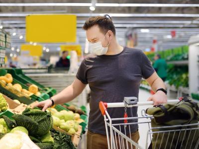 Man wearing mask in grocery store