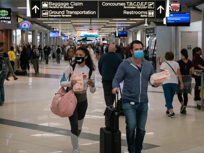 People wearing masks at the airport