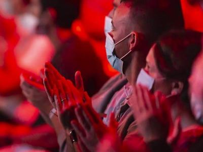 Masked audience at TED talk
