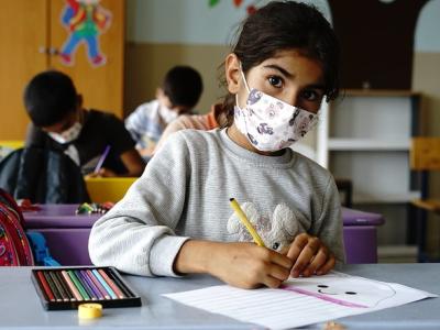 Masked schoolchildren