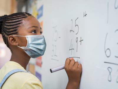 masked child whiteboard