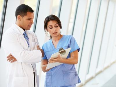 Medical consult in hospital hallway
