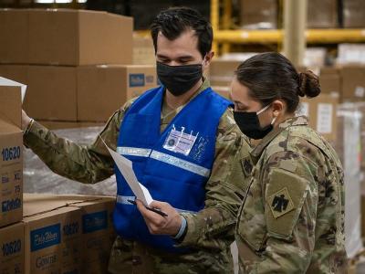 Taking inventory at medical supply warehouse