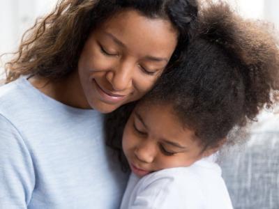 Mom comforting daughter