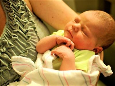 Mom holding baby in her arms