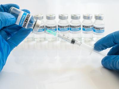Multiple mpox vaccine vials and syringe