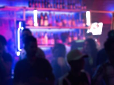 People in night club blurred image