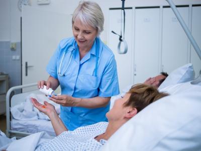 Nurse dispensing oral medication