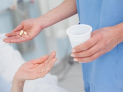 Nurse dispensing pills