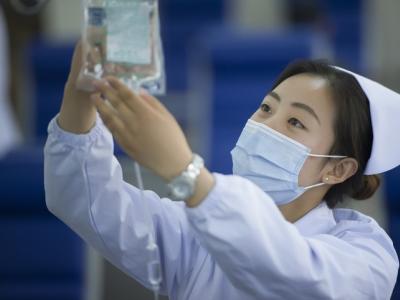 Nurse with IV drip