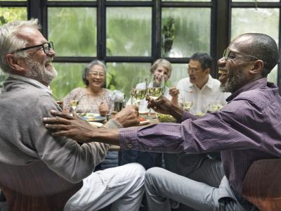 Group of seniors at dinner party