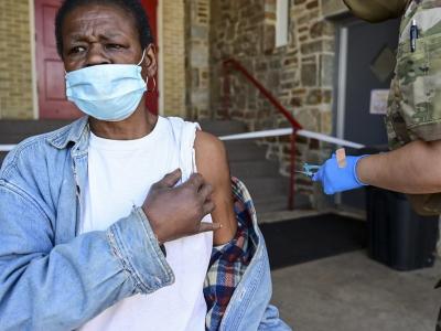 Older man getting COVID vaccine