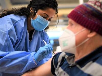 Older man getting vaccinated