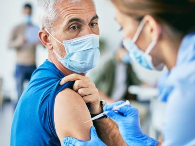 Older man getting vaccinated