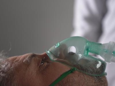 Older man with oxygen mask